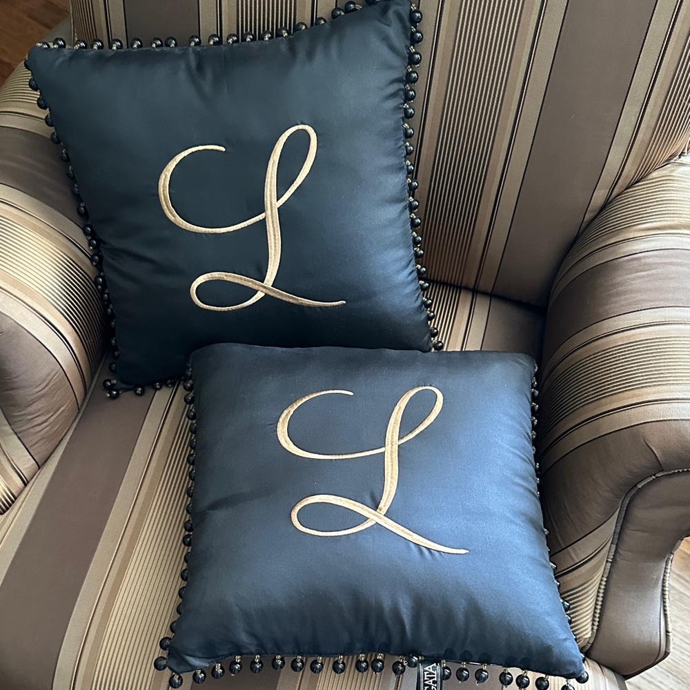 Elegant Black Throw “L” Pillows with Gold Lettering